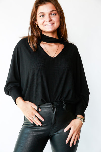 CUT OUT NECK TOP WITH BAT WING SLEEVES